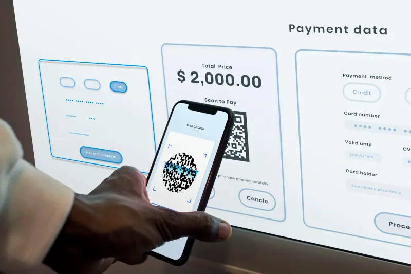 Person making an automatic payment via phone, illustrating SEPA Direct Debit